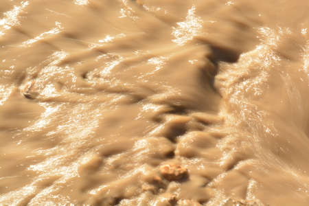 Muddy Water Stream. Photo made in Russian Sibiria.の写真素材
