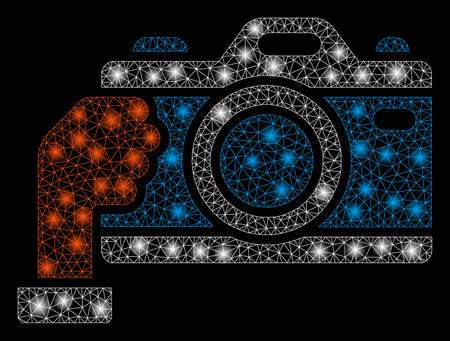 Glossy mesh hold camera with glare effect. Abstract illuminated model of hold camera icon. Shiny wire frame triangular mesh hold camera. Vector abstraction on a black background.のイラスト素材
