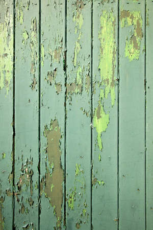 part of green weathered wooden fencing or boardingの写真素材