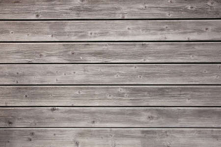 weathered grey boards of fencing or boardingの写真素材