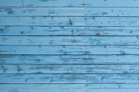part of weathered blue boards of fenceの写真素材