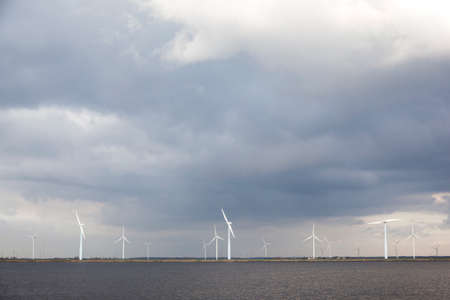 windmills and cloudy sky in the netherlands