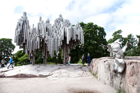people near statue of Jean Sibelius in sibelius park in helsinkiのeditorial素材