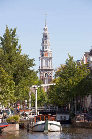 zuiderkerk and boats in amsterdam on a sunny dayのeditorial素材