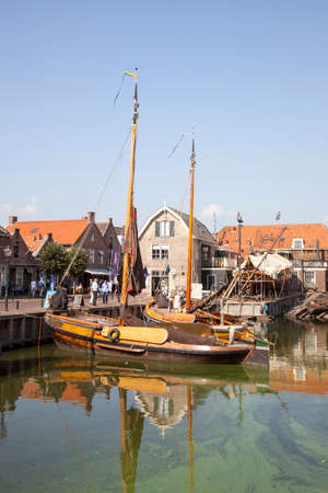 old dutch sailing vessels in the harbor of Spakenburg in the Netherlandsのeditorial素材