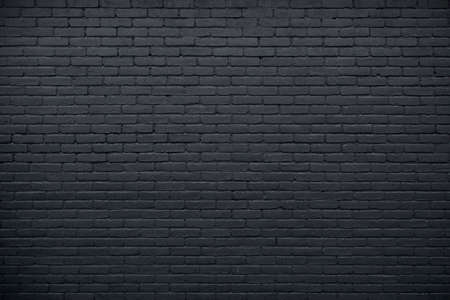 horizontal part of black painted brick wallの写真素材