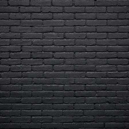 square part of black painted brick wallの写真素材