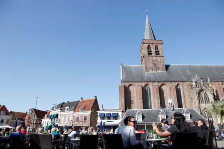 People enjoy the spring sunshine in the old city of amersfoortのeditorial素材