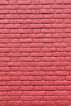 Vertical part of red painted brick wallの写真素材