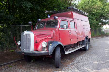 very old red mercedes fire truck parked in the netherlandsのeditorial素材