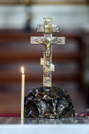 cross and candle in interior of uspenski cathedral in helsinki capital of finlandのeditorial素材