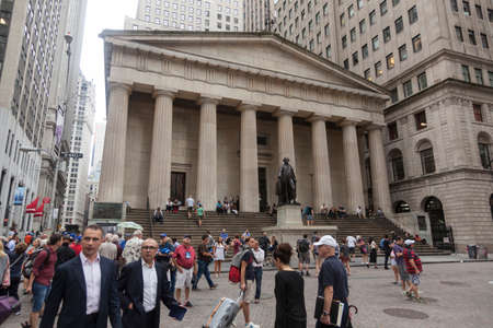 federal hall on wall street in downtown manhattan seen from broad streetのeditorial素材