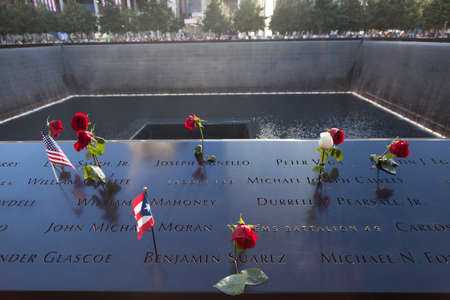 names and red roses on ground zero monument on 9-11 2015のeditorial素材