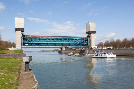 ship loaded with sand in prinses marijke sluis on amsterdam rijnkanaal in the netherlands in springの写真素材