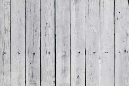dirty white vertical pine planks on fence in horizontal formatの写真素材