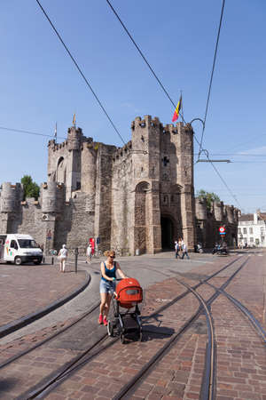 castle Gravensteen and city life on sunny summer day in Flemisch town of Ghent in Belgiumのeditorial素材