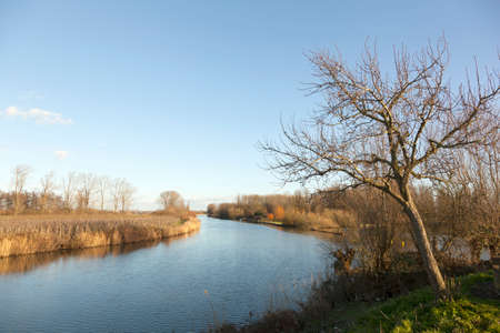 River Linge on winter day in the Netherlands between Leerdam and Geldermalsenの写真素材