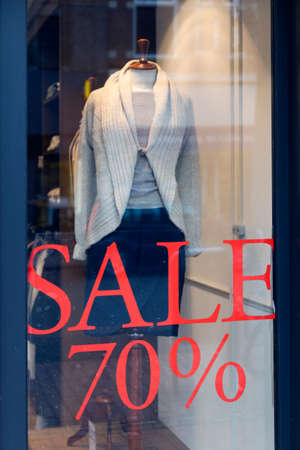 fashion doll with dress for women during sale and seventy percent discount in clothing store