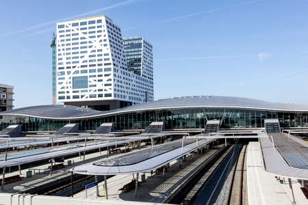 utrecht, netherlands, 15 march 2017: new railway station and bus station utrecht seen from footbridge on sunny spring day in the netherlandsのeditorial素材