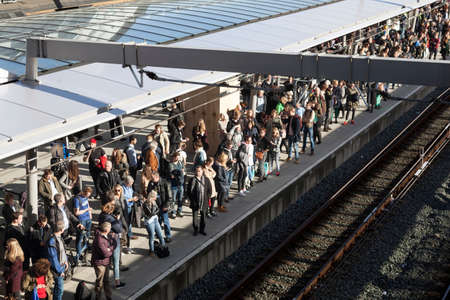 utrecht, netherlands, 15 march 2017: many travellers on platform of new central railway station in utrechtのeditorial素材