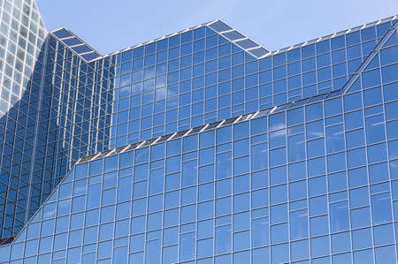 utrecht, Netherlands, 15march 2017: glass facade of rabobank head office in dutch town reflects...