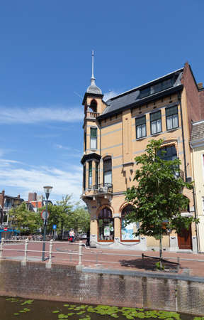 Famous old pharmacy building in Leeuwarden capital of friesland in the Netherlands on sunny summer day with blue skyのeditorial素材