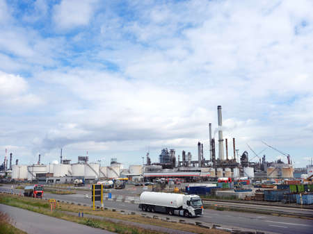 antwerpen, Belgium, 26 june 2017: tank trucks pass esso refinery in belgian port of antwerpのeditorial素材
