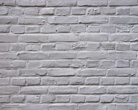 closeup of grey painted horizontal part of brick wallの写真素材