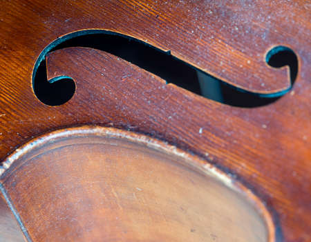 closeup of old double bass with f hole in resonance boxの写真素材