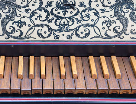 keyboard of old harpsichord with brown wooden keys
