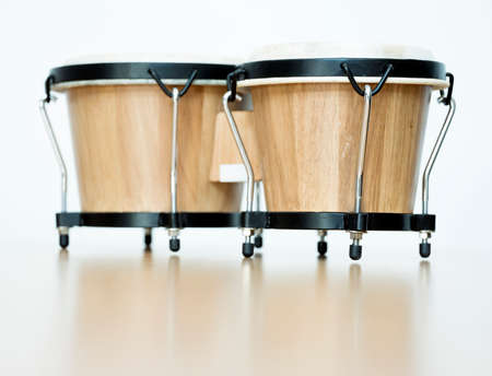 pair of bongos for children on reflecting surface in studioの写真素材