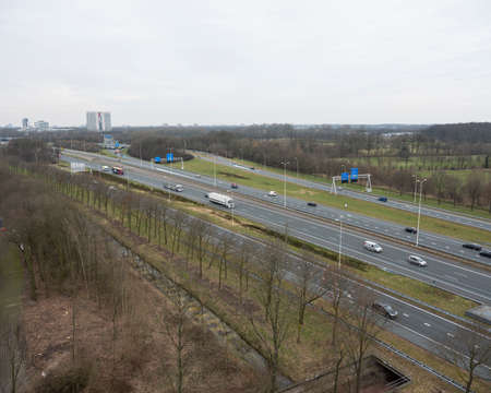 traffic on motorway A28 near utrecht uithof and zeist in the netherlandsの写真素材