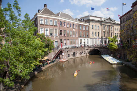 utrecht, netherlands, 15 may 2018: canoe and outdoor cafe in central canal oudegracht of old dutch town utrecht in summerのeditorial素材