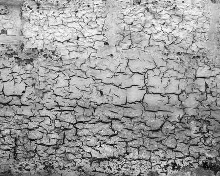 part of white cracked stucco abstract pattern