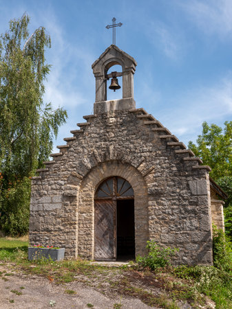old chapel under blue sky in french juraの写真素材