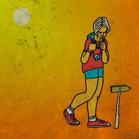 Girl traveling alone stops in front of a signpost on yellow backgroundの写真素材