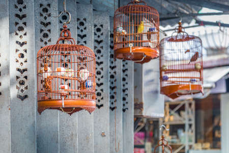 Bird cage hanging on streets, Hong Kongの写真素材