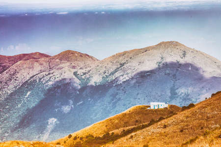 White house on hill, Autumn, Asiaの写真素材