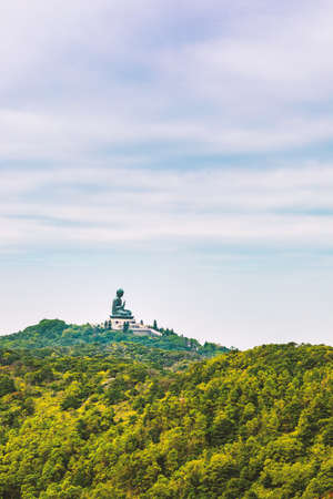 Giant Buddha Statue on the mountain, panorama, in vintage colorの写真素材