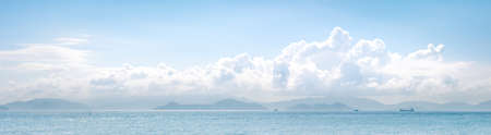 Cloudscape and ocean in sunny day, summerの写真素材