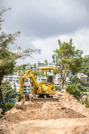 Excavator on construction site, outdoorの写真素材