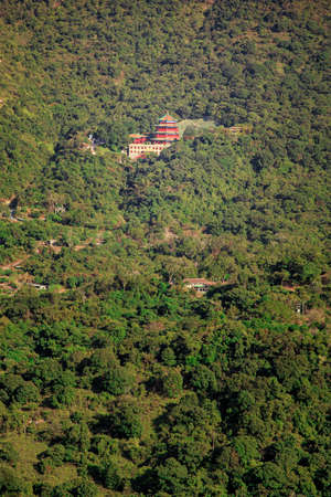Chinese Temple in the forest, Hong Kong.の写真素材
