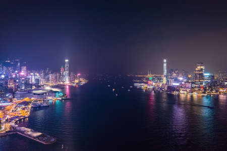 cyberpunk mood of the nightscape of Victoria Harbour, Hong Kong, panoramaの写真素材