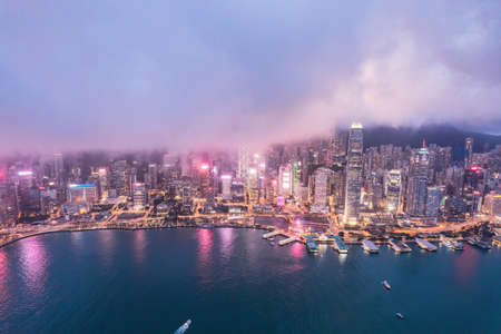Amazing night of Victoria Harbour, Hong Kong. cloudy day