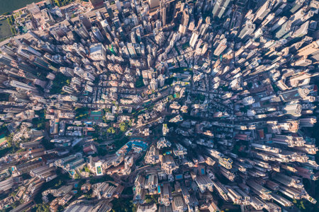 Over top view of the dense overcrowded skyscraper in Sheung Wan and Central district of Hong Kong, daytime, aerial viewの写真素材