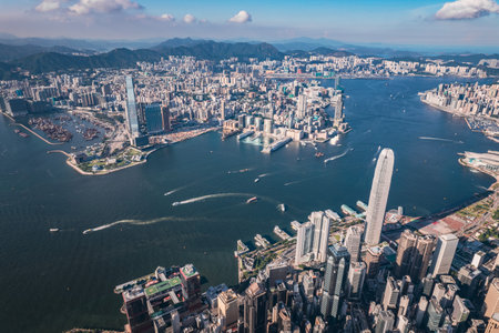 epic panorama of the Victoria Harbour and commercial area of Hong Kong, outdoor, daytime, aerial viewの写真素材