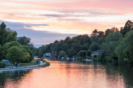 Golden hour, evening of the River Thames in Reading, Berkshire, UK, summerの写真素材