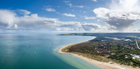 amazing aerial panorama view of Studland and Godlingston Heath National Nature Reserve in Bournemouth, Poole and Dorset, England. Wide angle daytimeの写真素材