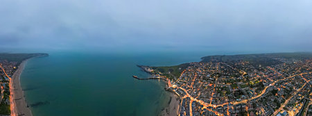 Aerial night view of the famous travel destination, Swanage, Dorset, South West England. blue hour...