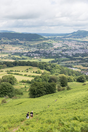 Hiker Backpacker on the mountain of Abergavenny, wales, England, summer outdoorの写真素材